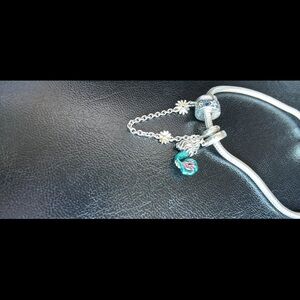 Elegant Silver Charm Bracelet with Green Accents